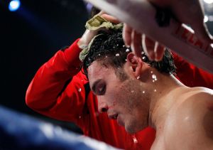 Julio Cesar Chavez Jr. of Mexico is treated in his corner between rounds during his bout against Sergio Martinez of Argentina at the Thomas & Mack Center in Las Vegas